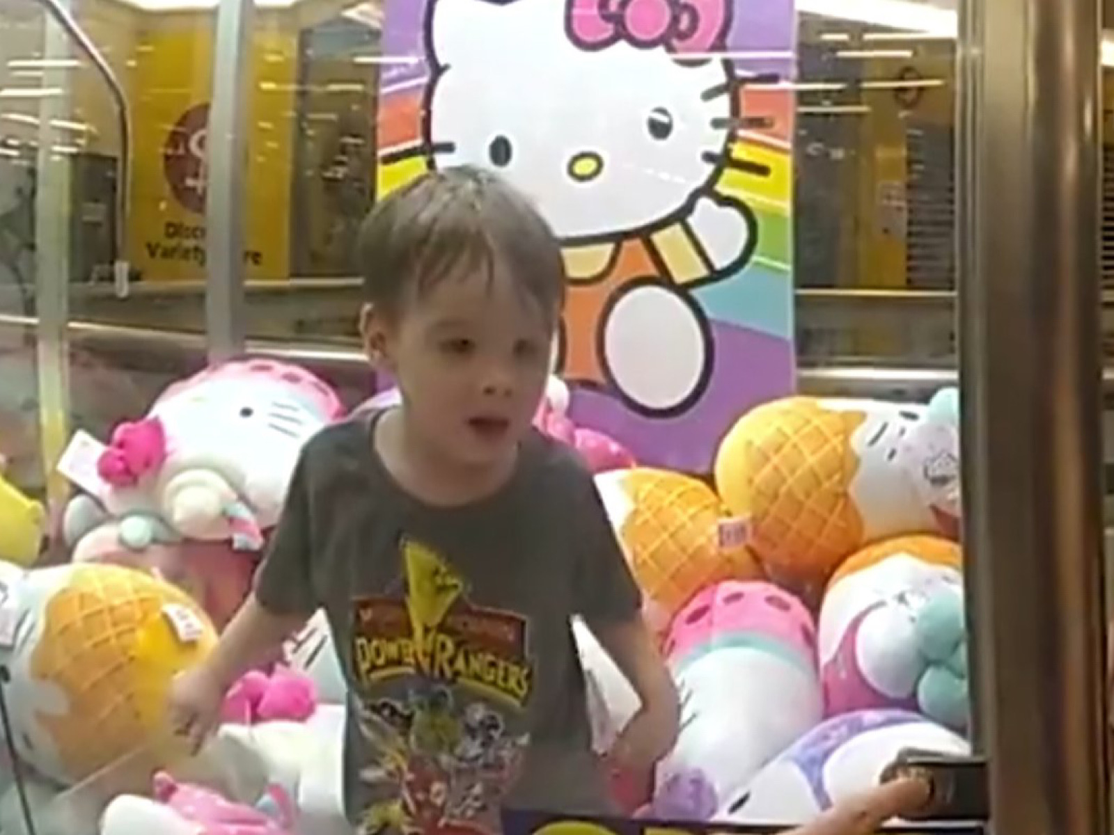 Toddler has ‘time of his life’ trapped inside toy-claw machine ...