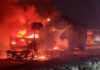 Gunmen shoot at drivers and burn three trucks