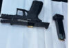 Two men arrested after viral video of women playing with guns
