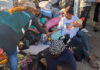 Thousands stranded as migrants wait for buses home